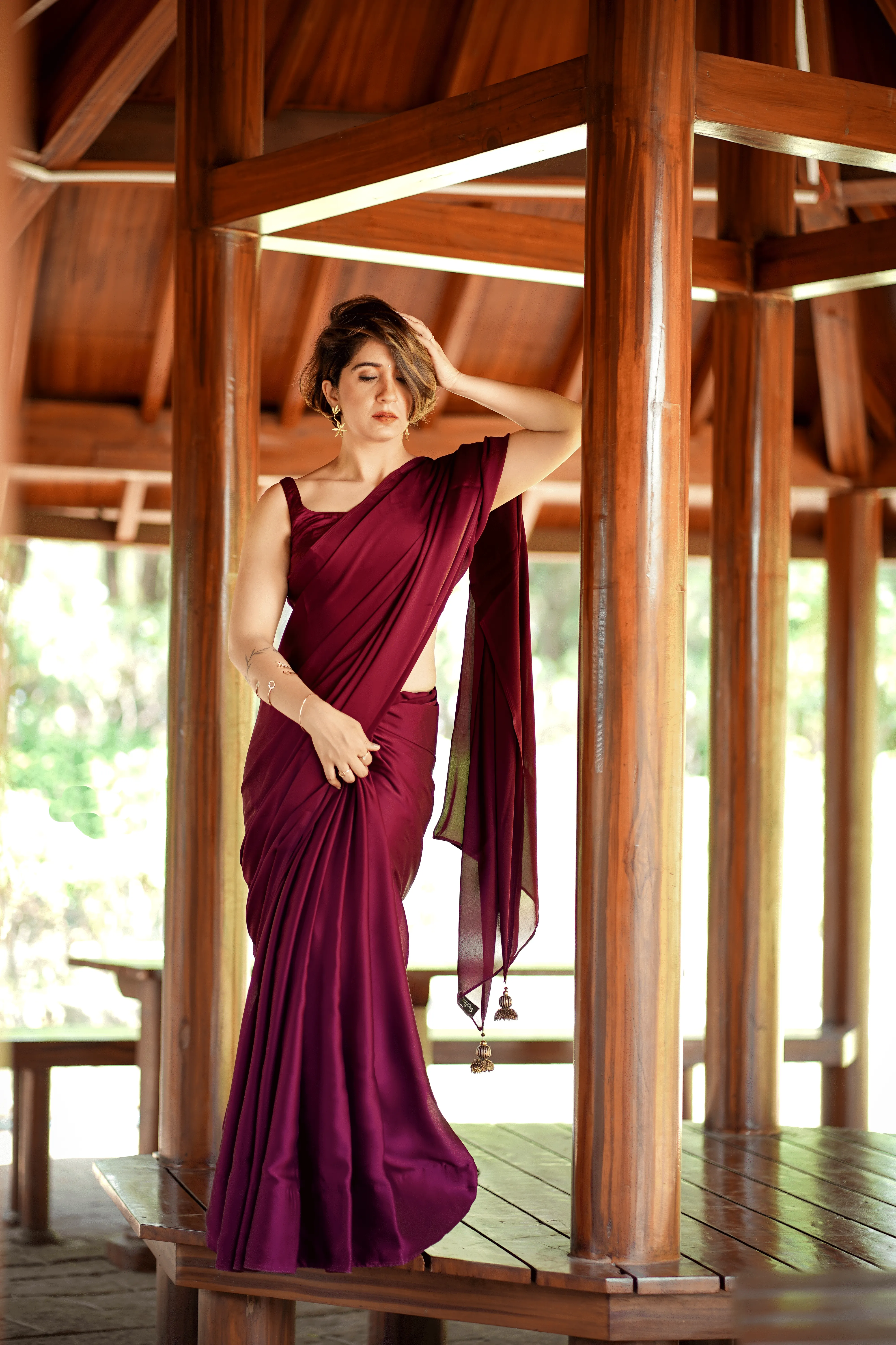 Wine Satin Saree with Bronze Pendants